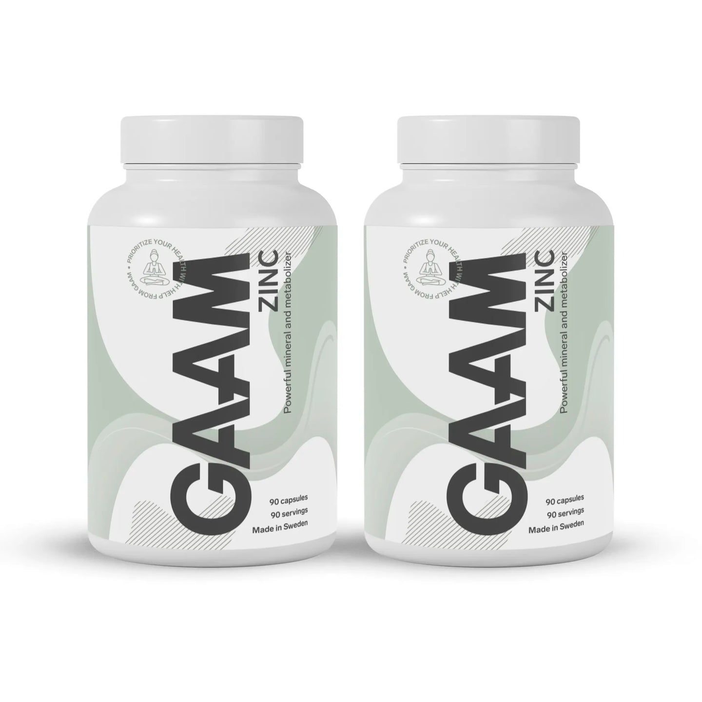 2 x GAAM Zinc 90 caps i två vita plastburkar med svart text och ljusgröna detaljer.