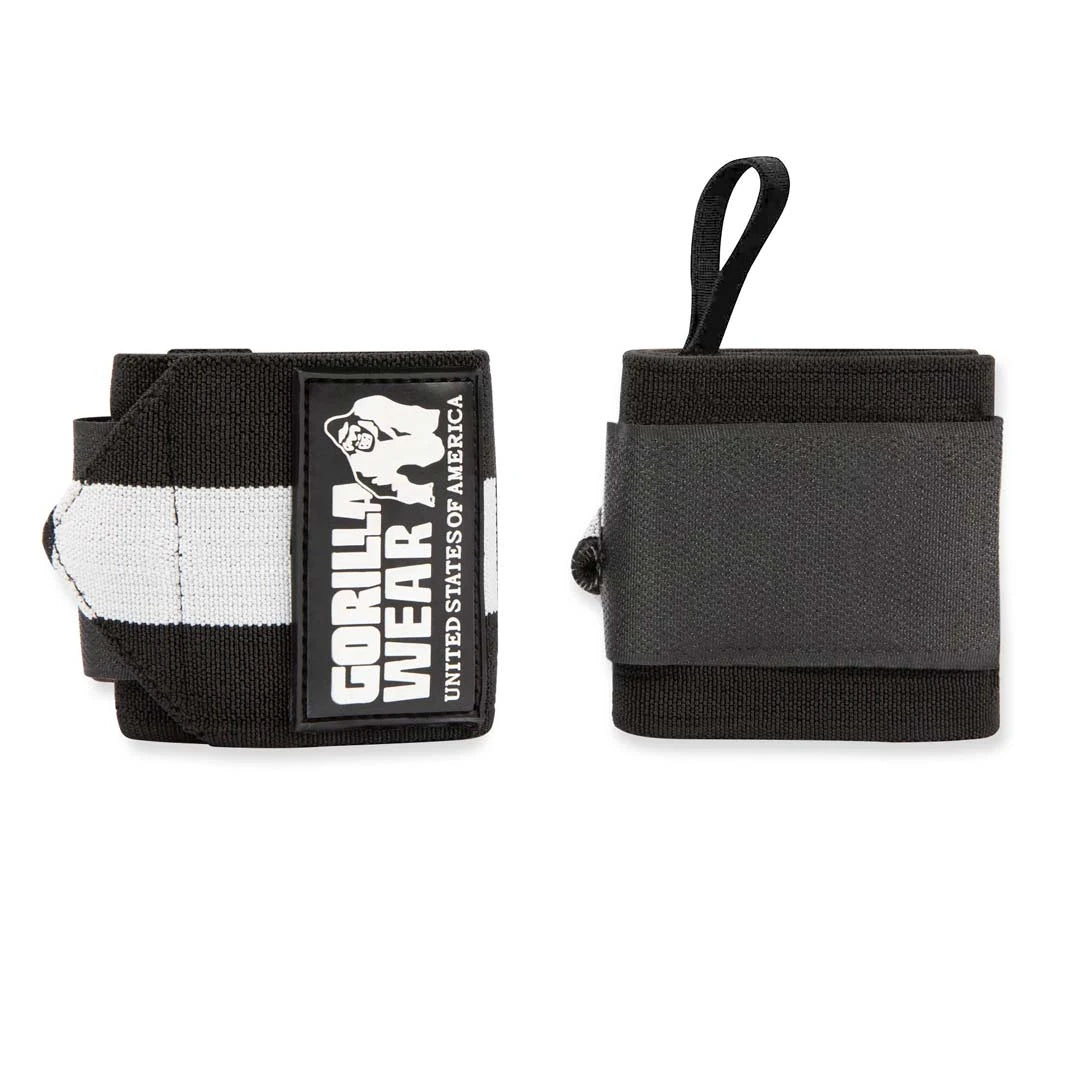 Gorilla Wear Wrist Wraps Ultra Black/White, elastiska svarta handledslindor med vita detaljer, logotyp och tumögla.