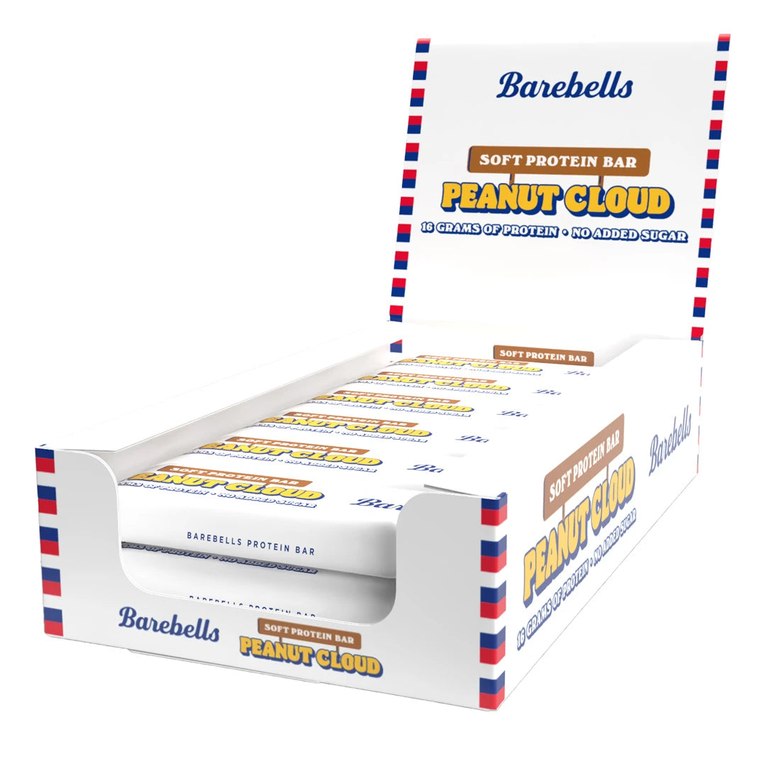 12 x Barebells Soft protein bar 55 g Peanut Cloud i en vit displaybox med röda och blå detaljer.