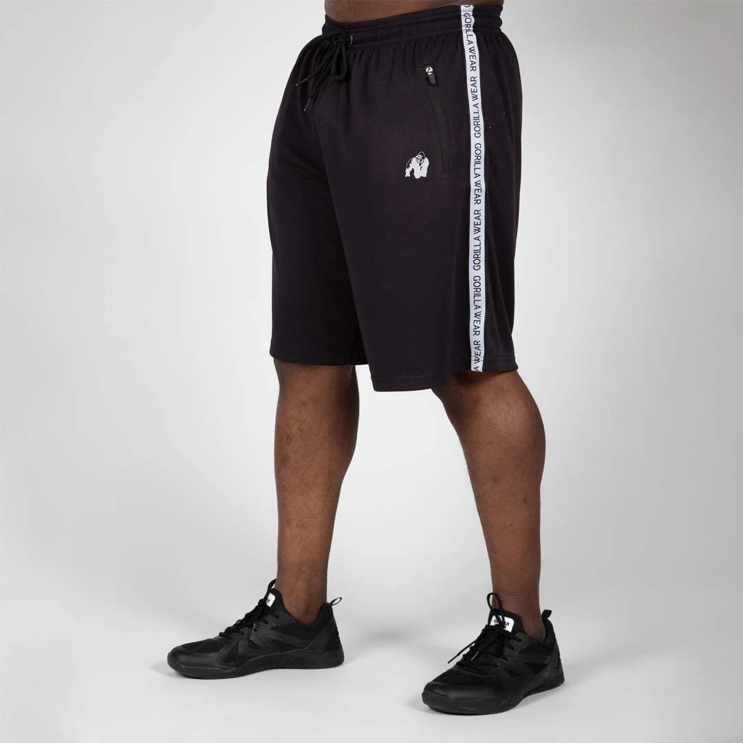 Gorilla Wear Reydon Mesh Shorts 2.0 Black är svarta träningsshorts i mesh med vit sidorevär och dragkedjefickor., bild 4 av 8