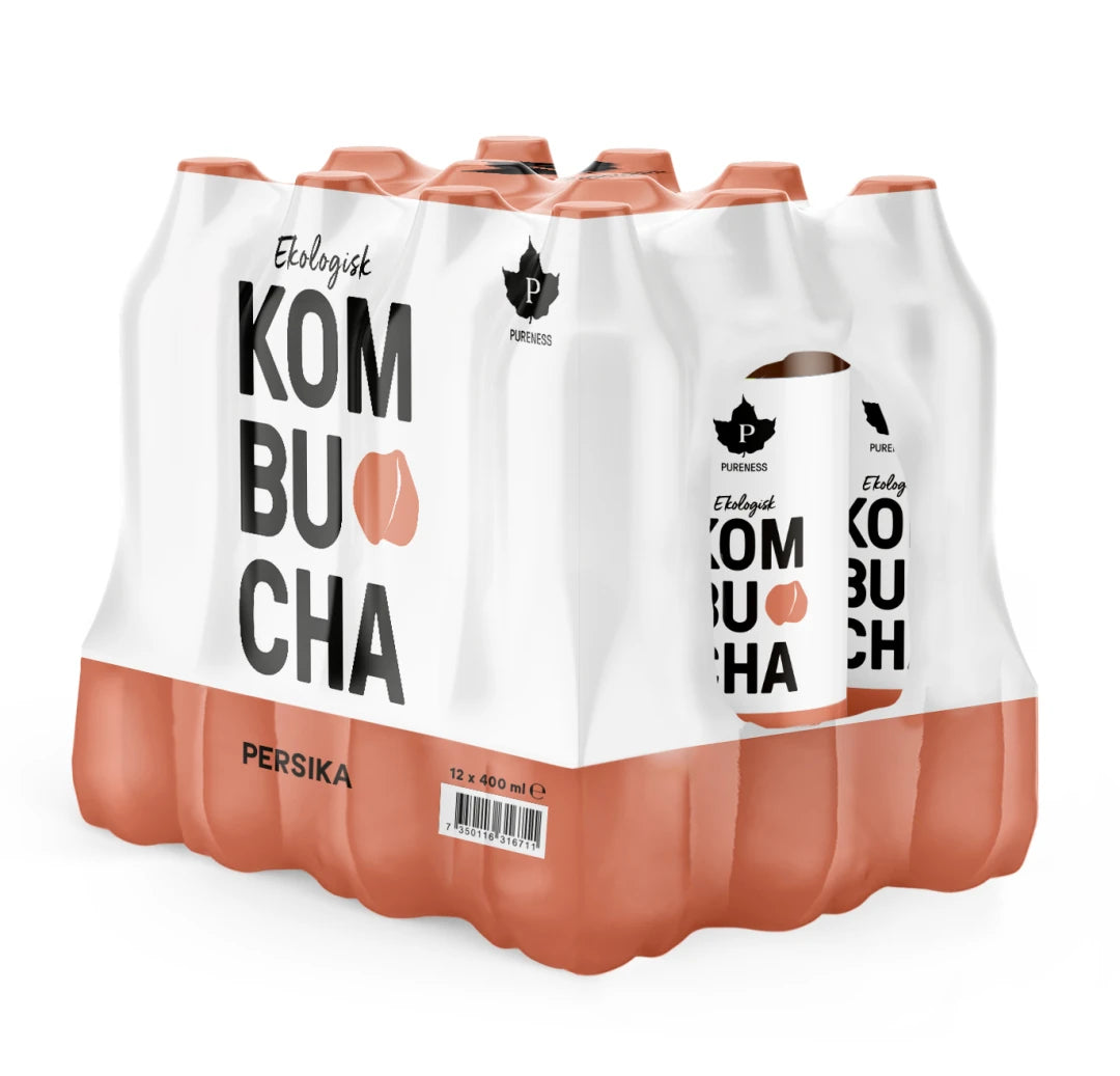 12 x Pureness Kombucha Eko 400 ml Persika i ett plastinplastat flerpack med vit och persikofärgad design., bild 1 av 1